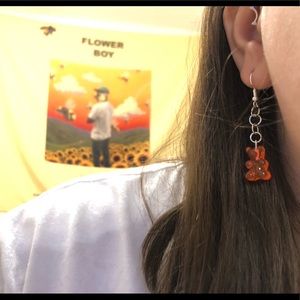 Red gummy bear earrings.
